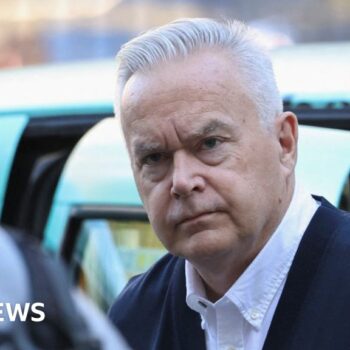 Watch: Silent Huw Edwards arrives at court