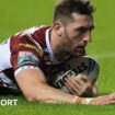 Jake Wardle dives to score a try for Wigan Warriors