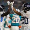 Titans pick up 1st win of season in ugly romp against Dolphins