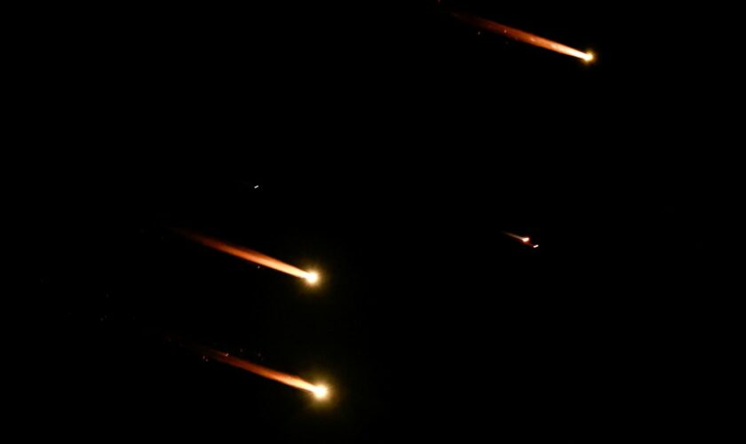 Rockets fly in the sky, amid cross-border hostilities between Hezbollah and Israel, as seen from Tel Aviv, Israel, October 1, 2024. REUTERS/Ammar Awad