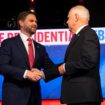 Tim Walz (R) and JD Vance shake hands at the 2024 Vice Presidential Debate Pic: AP