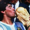 Diego Maradona kisses the World Cup after Argentina beat  West Germany in 1986