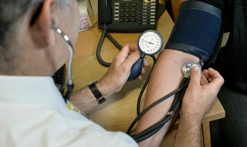 EMBARGOED TO 0001 THURSDAY SEPTEMBER 3 File photo dated 10/09/14 of a doctor checking a patient's blood pressure at the Temple Fortune Health Centre GP Practice near Golders Green, London. British adults in their 30s and 40s are healthier than their counterparts in the US - but are more likely to think their health is poor, a study has suggested. Issue date: Thursday October 3, 2024.