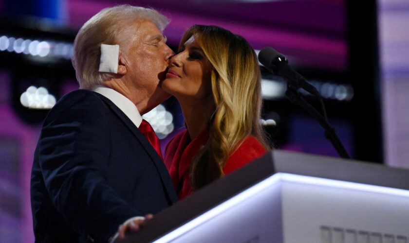 Republican presidential nominee and former U.S. President Donald Trump is joined on stage by his wife Melania after he finished giving his acceptance speech on Day 4 of the Republican National Convention (RNC), at the Fiserv Forum in Milwaukee, Wisconsin, U.S., July 18, 2024. REUTERS/Callaghan O'hare TPX IMAGES OF THE DAY