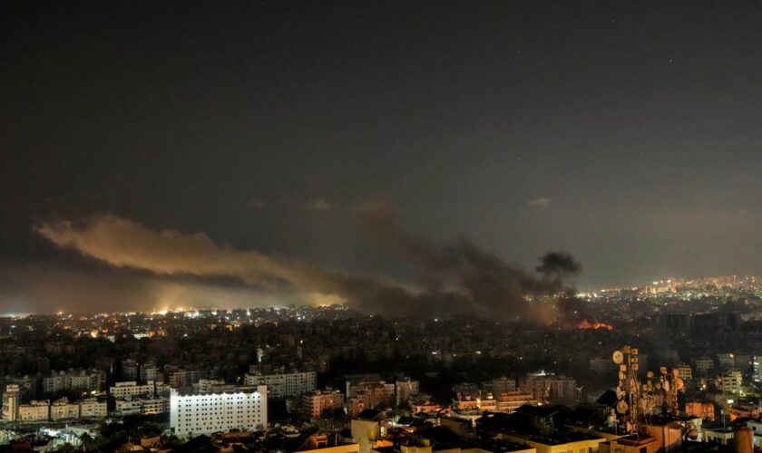 Middle East latest: A Hamas official is killed in an Israeli strike on a refugee camp