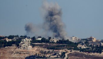 Smoke billows after an Israeli Air Force air strike on a village in southern Lebanon, amid hostilities between Hezbollah and Israel, as seen from northern Israel, October 4, 2024. REUTERS/Jim Urquhart