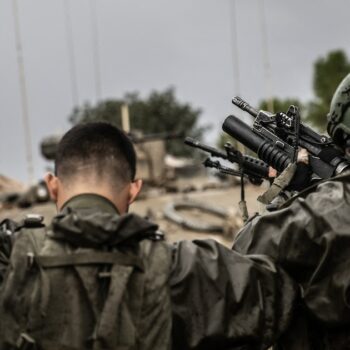 NAHAL OZ, ISRAEL - DECEMBER 13: Israeli soldiers, tanks, howitzers and armored vehicles are seen as Israeli military mobility continues on the Gaza border, in Nahal Oz, Israel on December 13, 2023. Mostafa Alkharouf / Anadolu (Photo by Mostafa Alkharouf / ANADOLU / Anadolu via AFP)