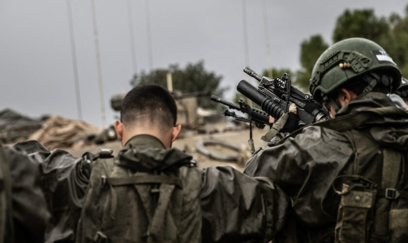 NAHAL OZ, ISRAEL - DECEMBER 13: Israeli soldiers, tanks, howitzers and armored vehicles are seen as Israeli military mobility continues on the Gaza border, in Nahal Oz, Israel on December 13, 2023. Mostafa Alkharouf / Anadolu (Photo by Mostafa Alkharouf / ANADOLU / Anadolu via AFP)