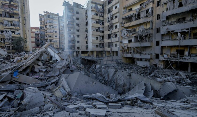 Destroyed buildings at the site of Israeli airstrikes in Dahieh, Beirut, Lebanon, Sunday, Oct. 6, 2024. (AP Photo/Bilal Hussein)