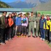 The British and US climbers posing with rescuers in Joshimath, Uttarakhand. Pic: Indian Air Force/Reuters