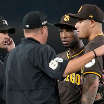 Padres' NLDS Game 2 win over Dodgers turns ugly as fans throw objects at San Diego players