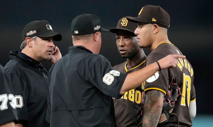 Padres' NLDS Game 2 win over Dodgers turns ugly as fans throw objects at San Diego players