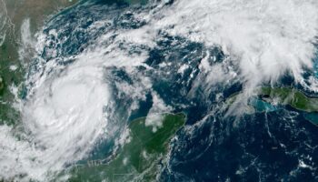 A satellite image shows Tropical Storm Milton intensifying and on track to become a hurricane before its expected landfall in Florida, in the Gulf of Mexico October 6, 2024. CIRA/NOAA/Handout via REUTERS THIS IMAGE HAS BEEN SUPPLIED BY A THIRD PARTY.