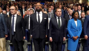 (left to right) Tory leadership candidates Tom Tugendhat, James Cleverly, Robert Jenrick and Kemi Badenoch singing the national anthem during the Conservative Party Conference at the International Convention Centre in Birmingham. Picture date: Wednesday October 2, 2024. PA Photo. See PA story POLITICS Tories. Photo credit should read: Stefan Rousseau/PA Wire