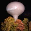 Resident fined $100 a day for projecting Trump sign on water tower