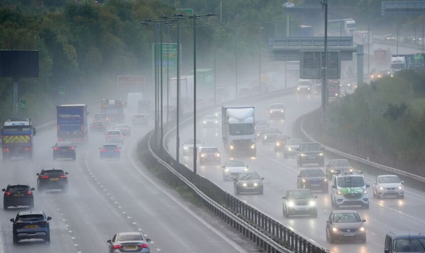 Motorists drive along the A14 near Kettering in Northamptonshire, after thundery showers on Monday brought big downpours in places, with surface water on the roads and lightning and hail. Picture date: Tuesday October 8, 2024. PA Photo. Photo credit should read: Joe Giddens/PA Wire