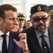 French President Emmanuel Macron (C-L) gestures as he speaks with Morocco's King Mohamed VI (C-R) upon their arrival at Rabat Agdal train station for the inauguration of a high-speed railway line on November 15, 2018. French President Emmanuel Macron visits Morocco to take part in the inauguration of a high-speed railway line that boasts the fastest journey times in Africa or the Arab world. (Photo by FADEL SENNA / AFP)