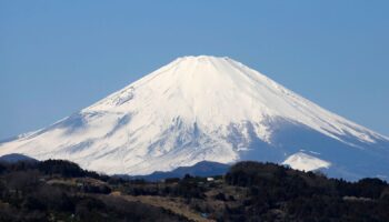 Japan's Mount Fuji is seen covered with snow from Nakai town, Kanagawa prefecture, Japan, March 1, 2016. REUTERS/Issei Kato