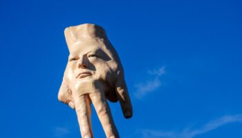 A New Zealand city waves goodbye to its giant hand sculpture that many came to love