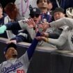 New York Yankees fans who interfered with catch and grabbed player banned from World Series match