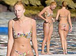 Boris Becker's daughter Anna Ermakova, 24, flaunts her toned frame on holiday in Monaco after mysteriously skipping her father's lavish wedding