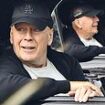 Bruce Willis smiles in rare sighting as he dons Dodgers cap on drive with bodyguard in LA amid aphasia and dementia battle