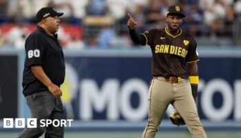 Jurickson Profar of the San Diego Padres points to the crowd