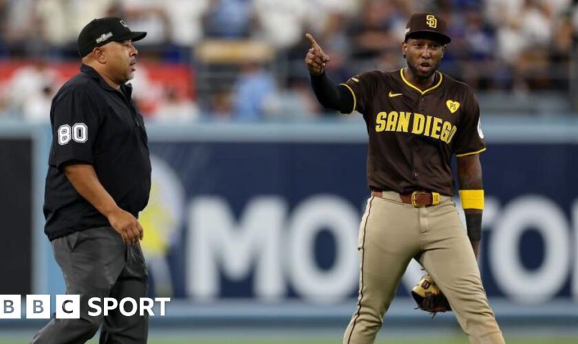 Jurickson Profar of the San Diego Padres points to the crowd