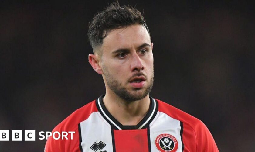 George Baldock playing for Sheffield United in the Premier League