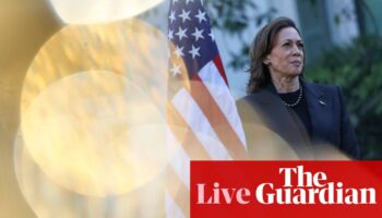 Harris takes narrow lead over Trump in new poll as swing states still tight – US politics live