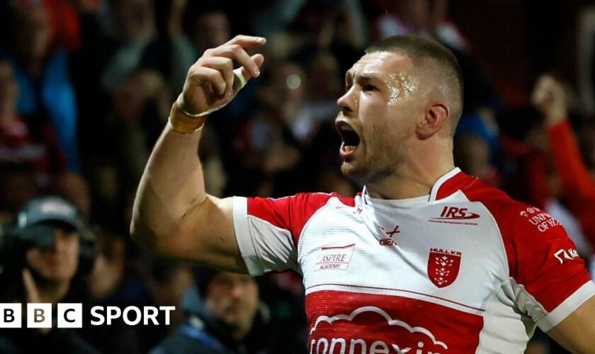 Hull KR's James Batchelor celebrates scoring the opening try against Warrington.