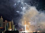 Las Vegas' iconic Tropicana resort is blown-up in firework and drone-studded farewell ceremony