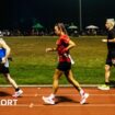 Competitors run through the night in the Sri Chinmoy 24hr Track Race in Battersea Park