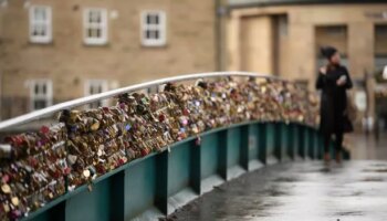 Love locks removed from landmark bridge in tourist hotspot