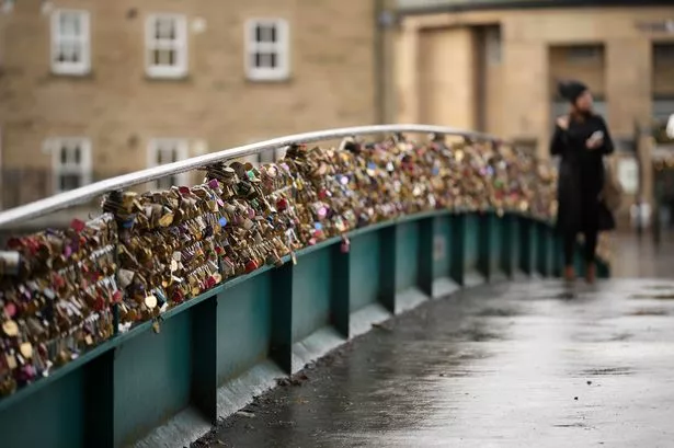 Love locks removed from landmark bridge in tourist hotspot