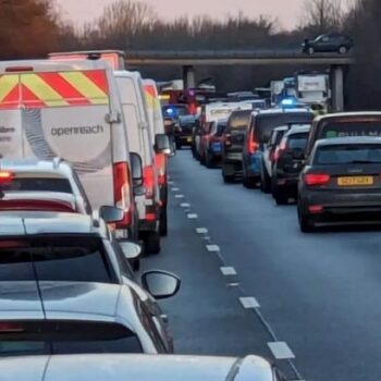 M11 closed as drivers face 'several hours' of delays with air ambulance on scene