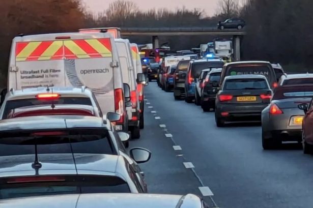 M11 closed as drivers face 'several hours' of delays with air ambulance on scene