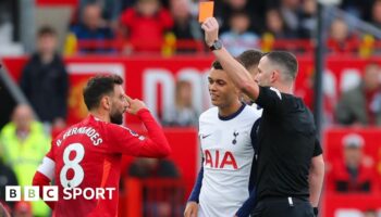 Manchester United's Bruno Fernandes is sent off in a Premier League match against Tottenham at Old Trafford