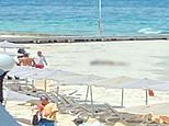 Man shot to death by assassins who fled on jet skis outside at Cancun resort Hotel Riu