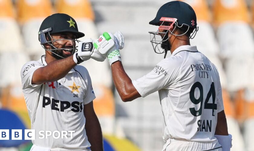 Pakistan's Abdullah Shafique celebrates with his captain Shan Masood after scoring a century during the first day of the first Test between Pakistan and England at the Multan Cricket Stadium