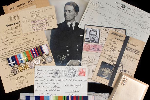 Medals of World War 2 hero who was Colditz prisoner of war sell at auction for £48,000