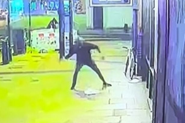 Moment brick-wielding thieves smash suit shop window and take off on bikes with £6,000 in loot