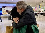 Moment husband is reunited with his wife after fleeing war-torn Beirut in emotional homecoming at Heathrow Airport - as first flights getting Brits out of Lebanon depart