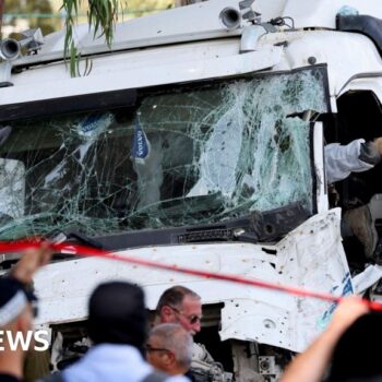 One dead, dozens injured after truck hits Israel bus stop