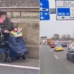 Pensioner cruises wrong way down busy motorway - on a motorised wheelchair