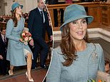 Queen Mary of Denmark beams in cool green as she heads to opening of parliament with King Frederik