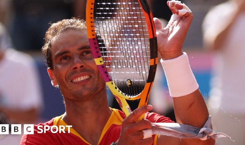 Rafael Nadal waves to the crowd at Roland Garros during the Paris Olympics