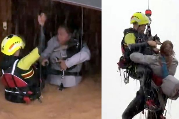 Spain floods: Nail-biting moment woman and her dog airlifted from rushing floodwaters