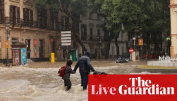 Spain floods: rescue workers search for survivors but death toll expected to rise – latest updates