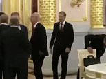 Toe-curling moment Putin crony Kadyrov performs bizarre standing press ups then looks around for Russian minister's reaction… but it's not exactly what he hoped for